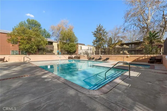 a view of a terrace with sitting area