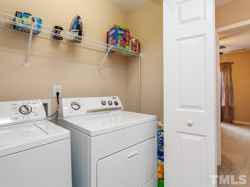 6621 Morgantown Street Raleigh, NC 27616 - Photo 23 of 25 a utility room with dryer and washer