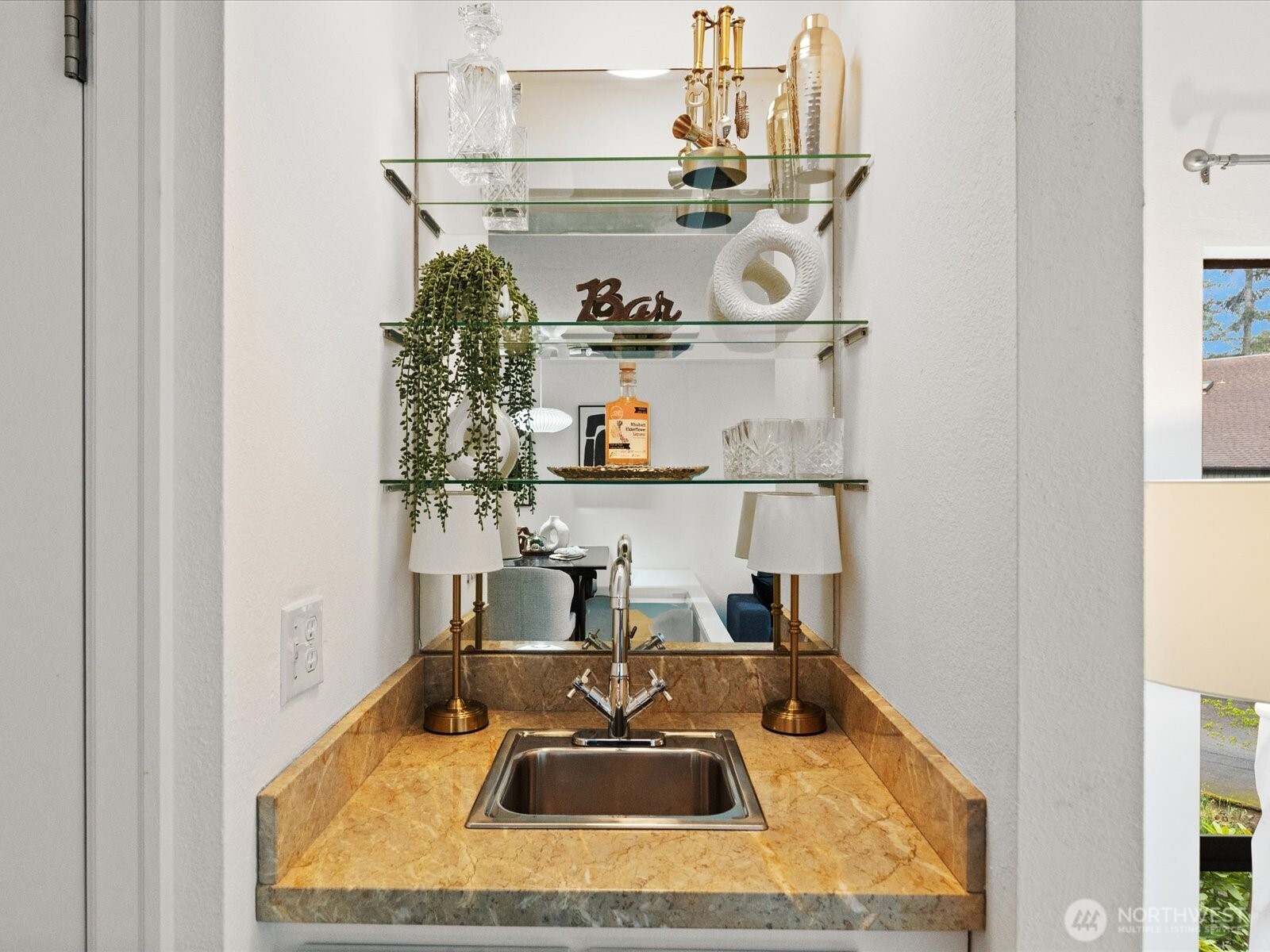 3506 108th Place Northeast, Unit 2 Bellevue, WA 98004 - Photo 11 of 39 a room with two chairs and a wooden floor