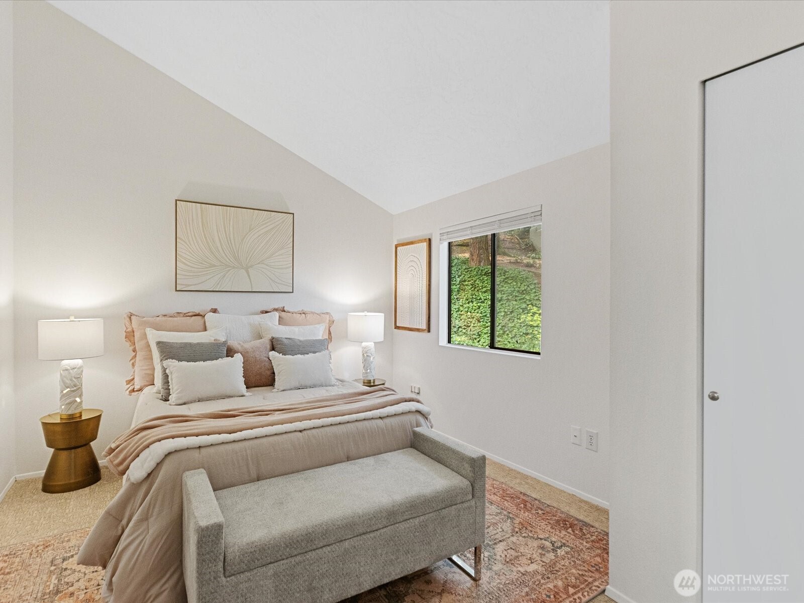 3506 108th Place Northeast, Unit 2 Bellevue, WA 98004 - Photo 20 of 39 a bedroom with a bed and a window