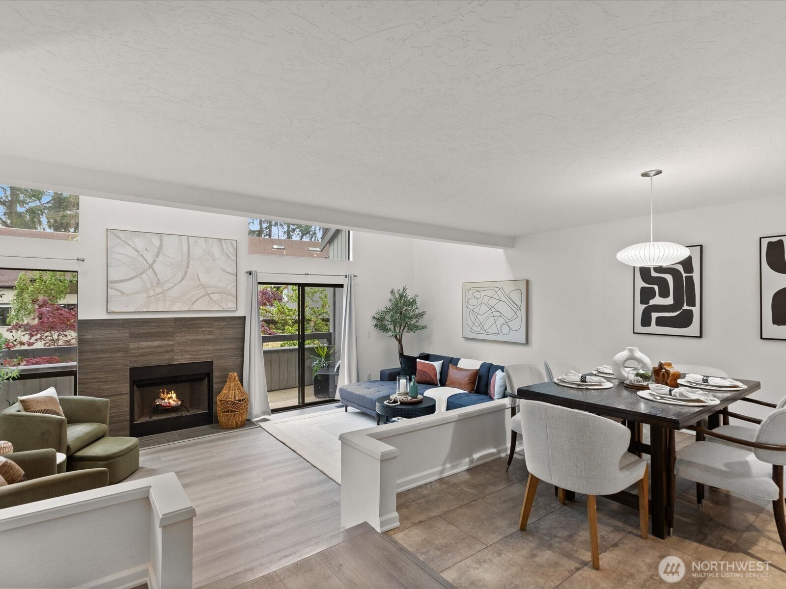 3506 108th Place Northeast, Unit 2 Bellevue, WA 98004 - Photo 2 of 39 a living room with furniture and a fireplace