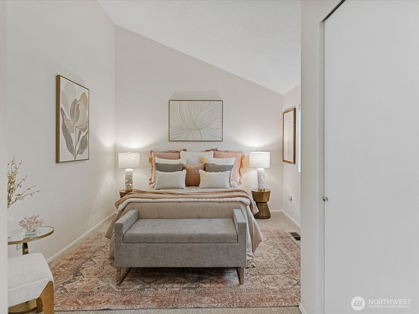 3506 108th Place Northeast, Unit 2 Bellevue, WA 98004 - Photo 21 of 39 a bedroom with a bed and a painting on the wall