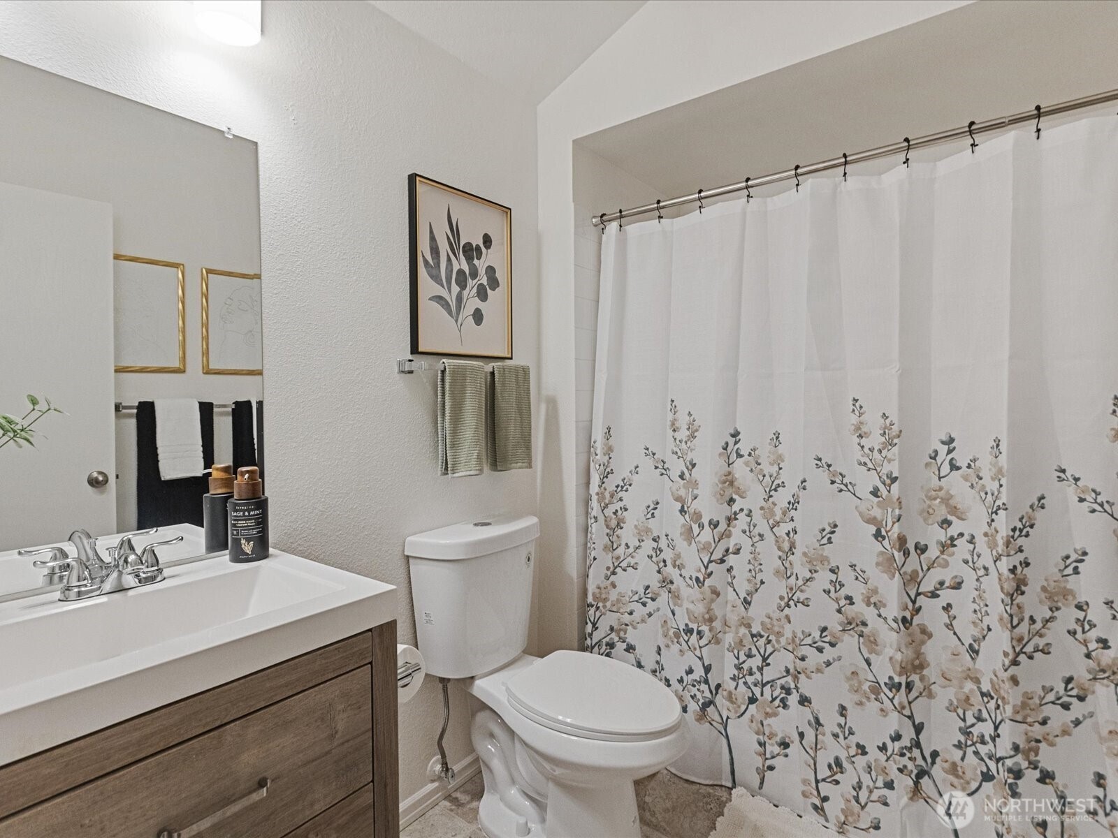 3506 108th Place Northeast, Unit 2 Bellevue, WA 98004 - Photo 23 of 39 a bathroom with a toilet a sink and a mirror