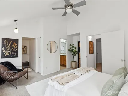 a bedroom with a bed and dresser