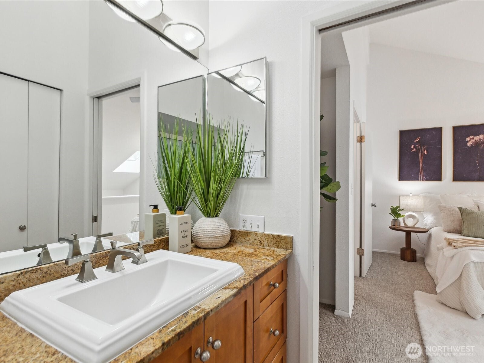 3506 108th Place Northeast, Unit 2 Bellevue, WA 98004 - Photo 30 of 39 a bathroom with a sink a mirror and a toilet
