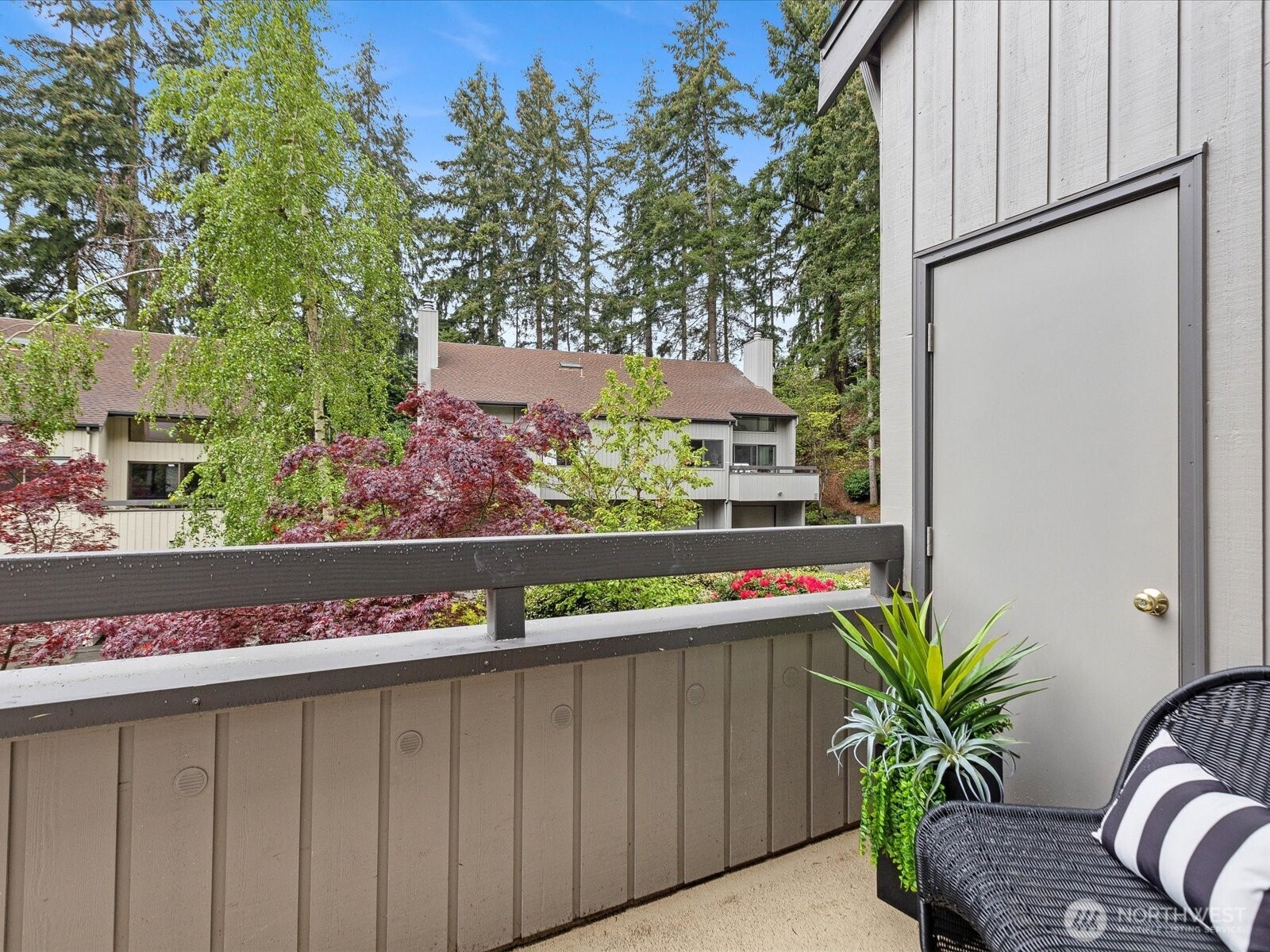 3506 108th Place Northeast, Unit 2 Bellevue, WA 98004 - Photo 35 of 39 a view of outdoor space with deck and outdoor seating