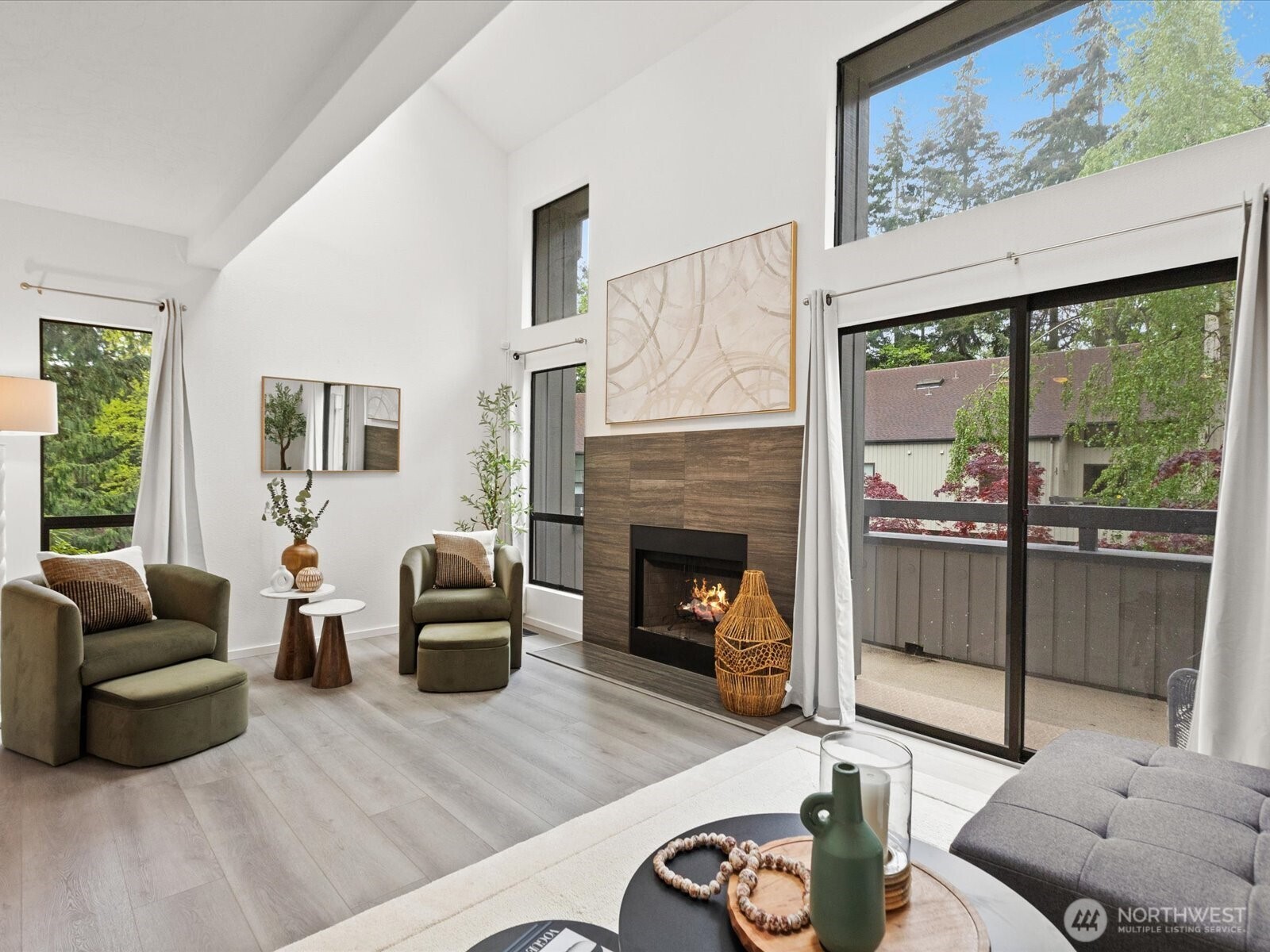 3506 108th Place Northeast, Unit 2 Bellevue, WA 98004 - Photo 4 of 39 a living room with furniture and a fireplace