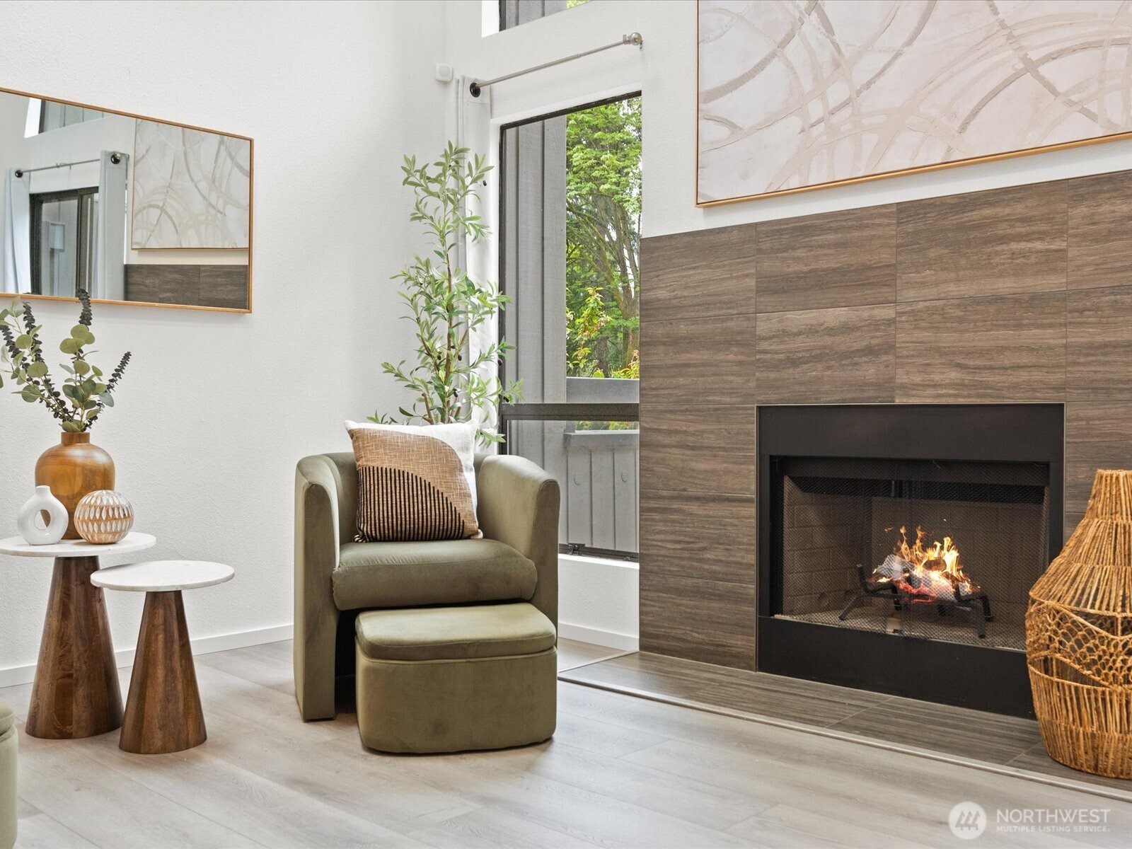 3506 108th Place Northeast, Unit 2 Bellevue, WA 98004 - Photo 5 of 39 a living room with furniture and a fireplace