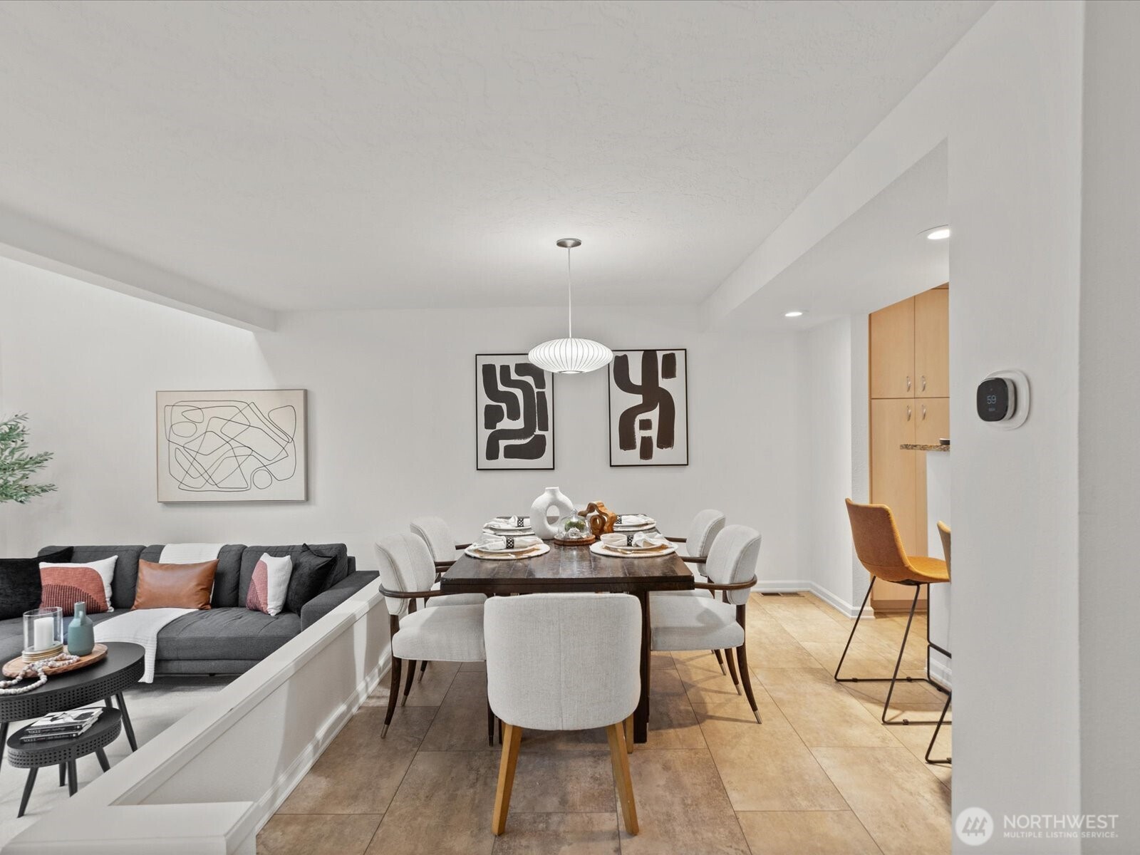 3506 108th Place Northeast, Unit 2 Bellevue, WA 98004 - Photo 6 of 39 a living room with furniture and rug