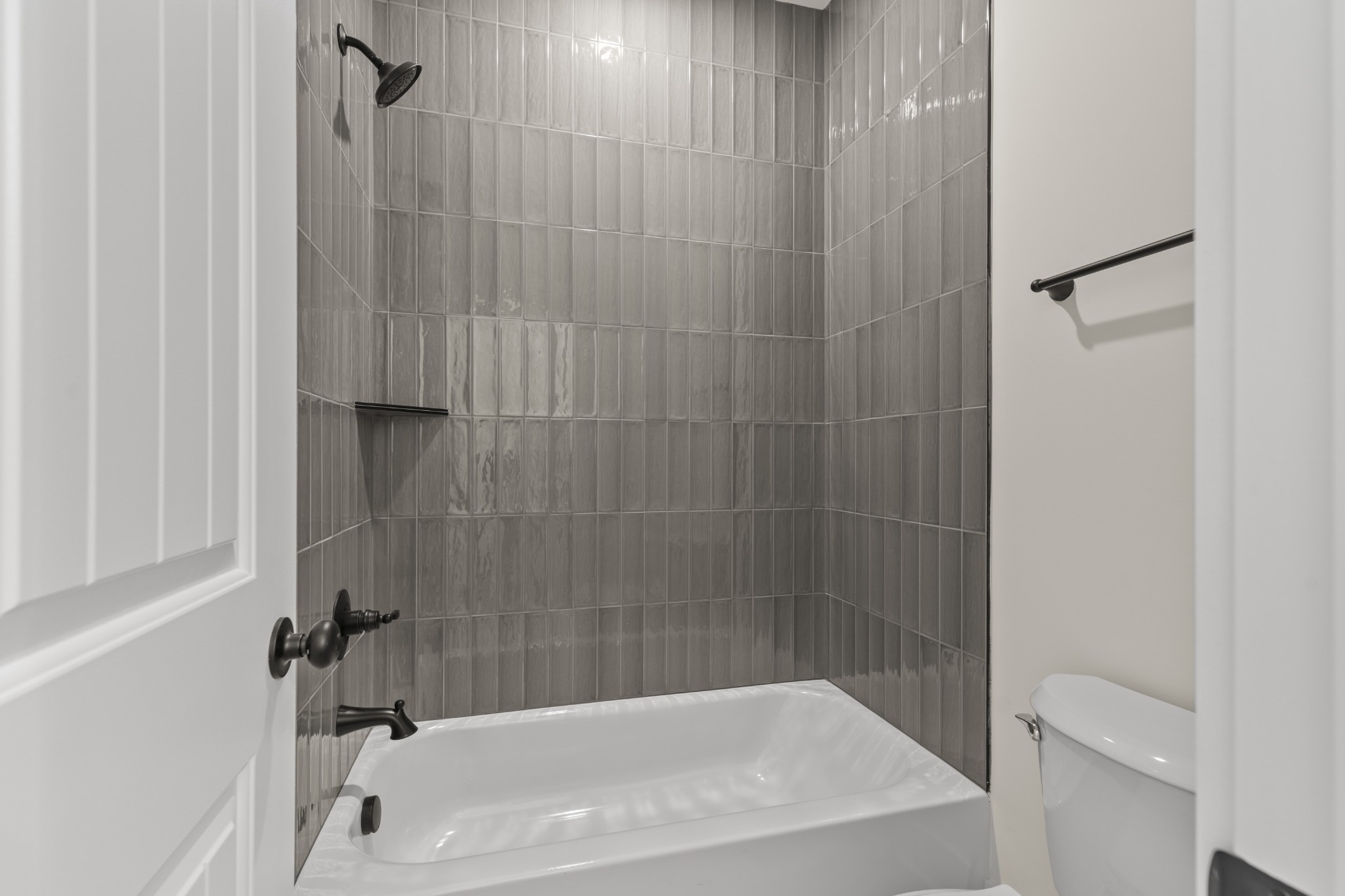 2969 Lights Chapel Road Greenbrier, TN 37073 - Photo 23 of 34 a bathroom with a bathtub and a shower