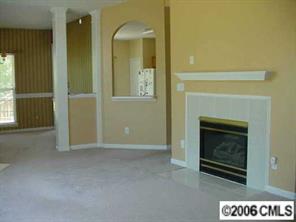 105 Kilborne Road Mooresville, NC 28117 - Photo 2 of 8 a view of an empty room and window