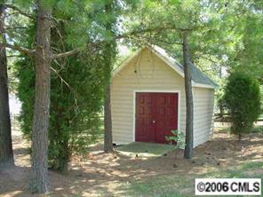105 Kilborne Road Mooresville, NC 28117 - Photo 6 of 8 a front view of a house with a yard