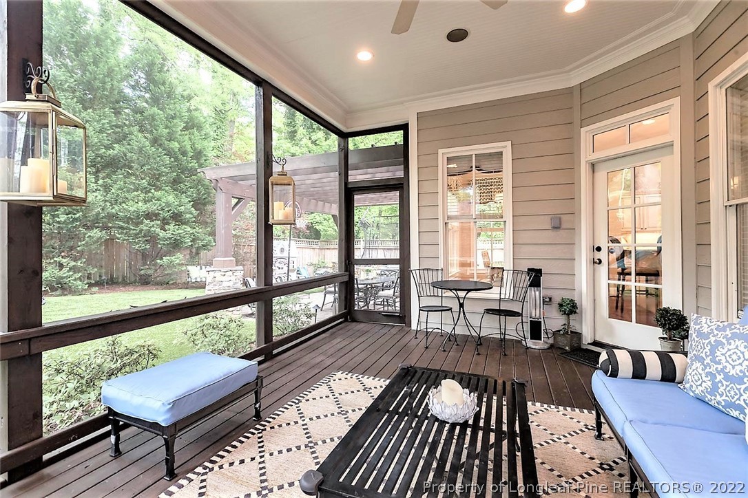 110 Lake Boone Trail Raleigh, NC 27608 - Photo 26 of 30 a living room with large windows and wooden floor
