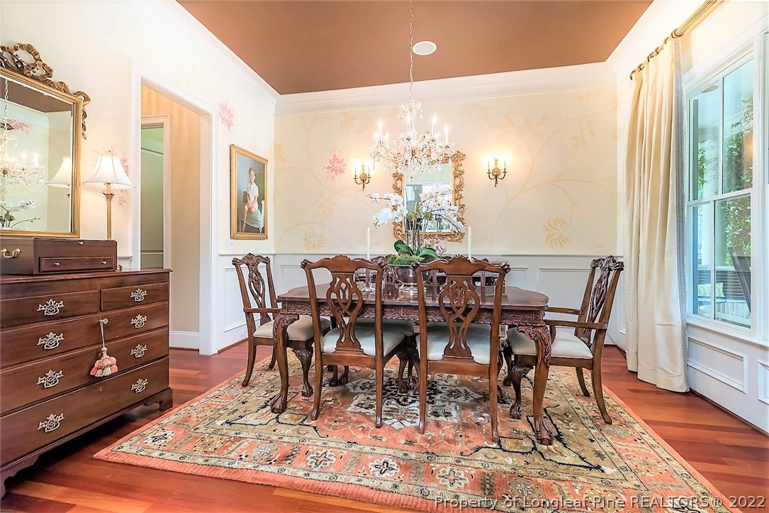110 Lake Boone Trail Raleigh, NC 27608 - Photo 4 of 30 a view of a dining room with furniture window and wooden floor