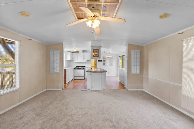 a view of a kitchen with a sink