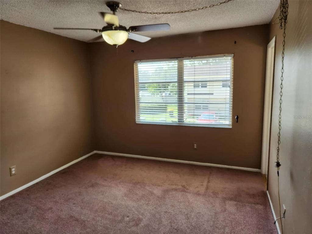 3773 Delta Street Sarasota, FL 34232 - Photo 11 of 15 a view of an empty room with a window