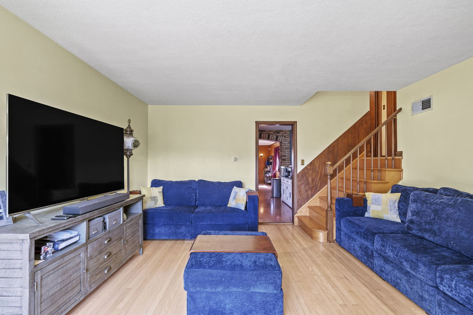2419 Elm Street River Grove, IL 60171 - Photo 2 of 15 a living room with furniture and a flat screen tv