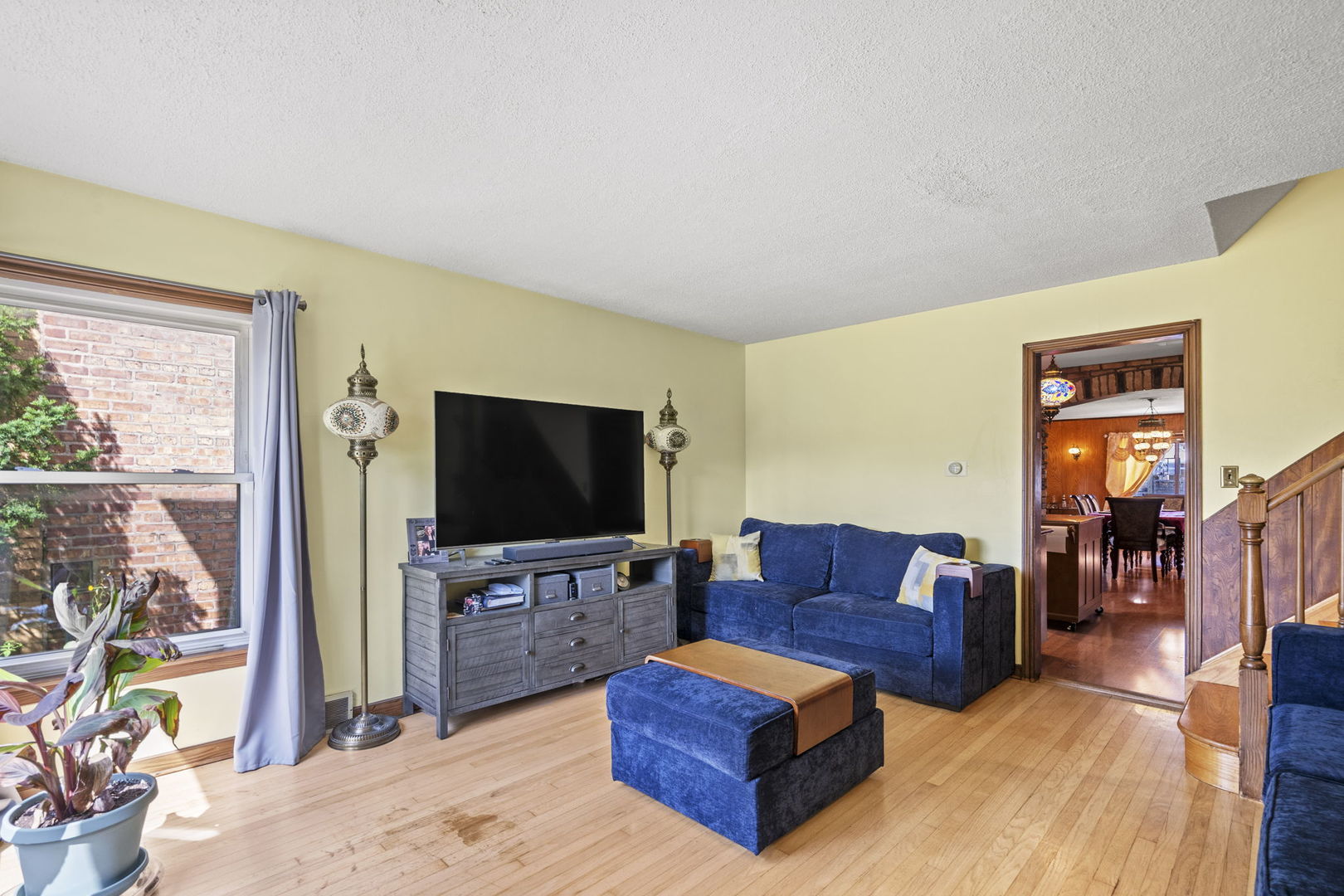 2419 Elm Street River Grove, IL 60171 - Photo 3 of 15 a living room with furniture and a flat screen tv