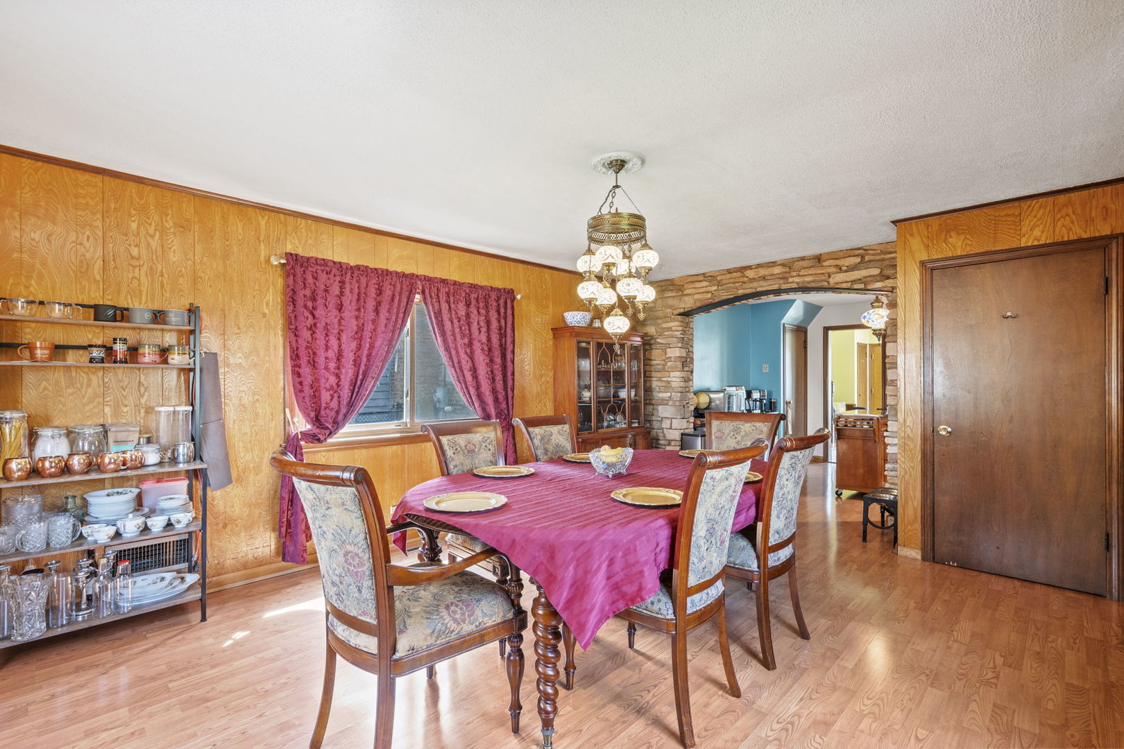 2419 Elm Street River Grove, IL 60171 - Photo 5 of 15 a view of a dining room with furniture and chandelier