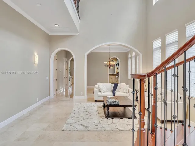 a kitchen with a sink stove and wooden cabinets