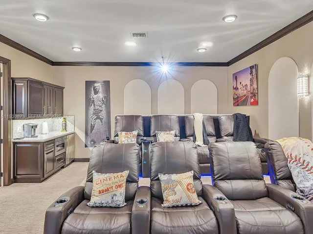 a picture of a bathroom with a sink and a mirror