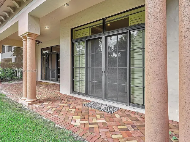 an aerial view of a house with a garden