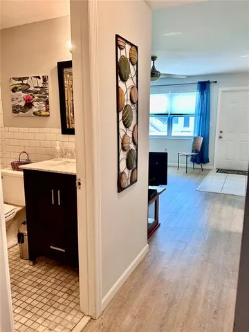 a view of a water fountain and a big yard of the house