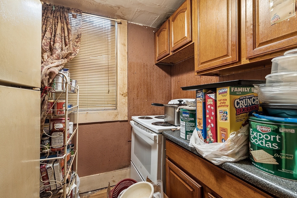 132 Hazel Street Fitchburg, MA 01420 - Photo 16 of 26 a view of storage and utility room