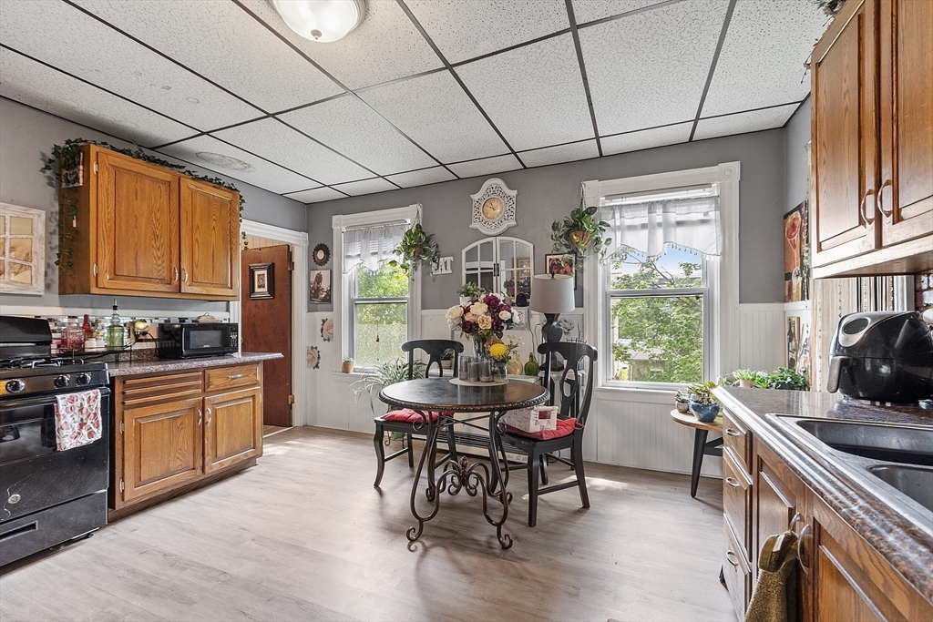 132 Hazel Street Fitchburg, MA 01420 - Photo 2 of 26 a view of a dining room with furniture window and outside view