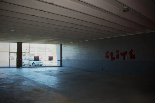 a view of a livingroom with an empty space and window