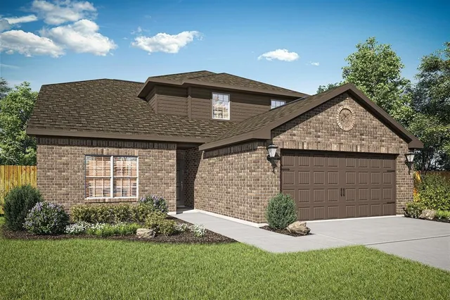 a front view of a house with a garden and plants