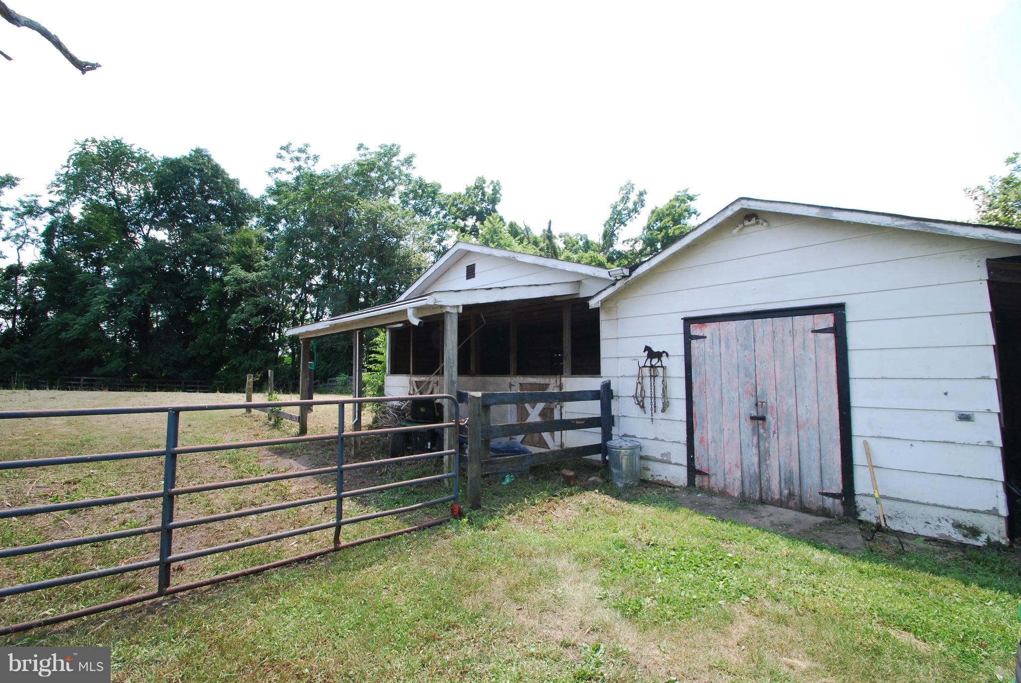 10775 Cliff Mills Road Marshall, VA 20115 - Photo 13 of 17 a front view of a house with a yard