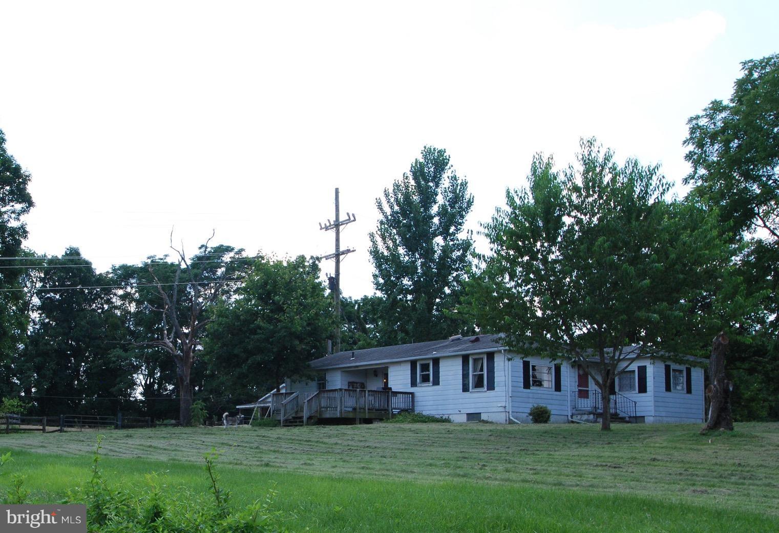 10775 Cliff Mills Road Marshall, VA 20115 - Photo 16 of 17 a view of house with a yard