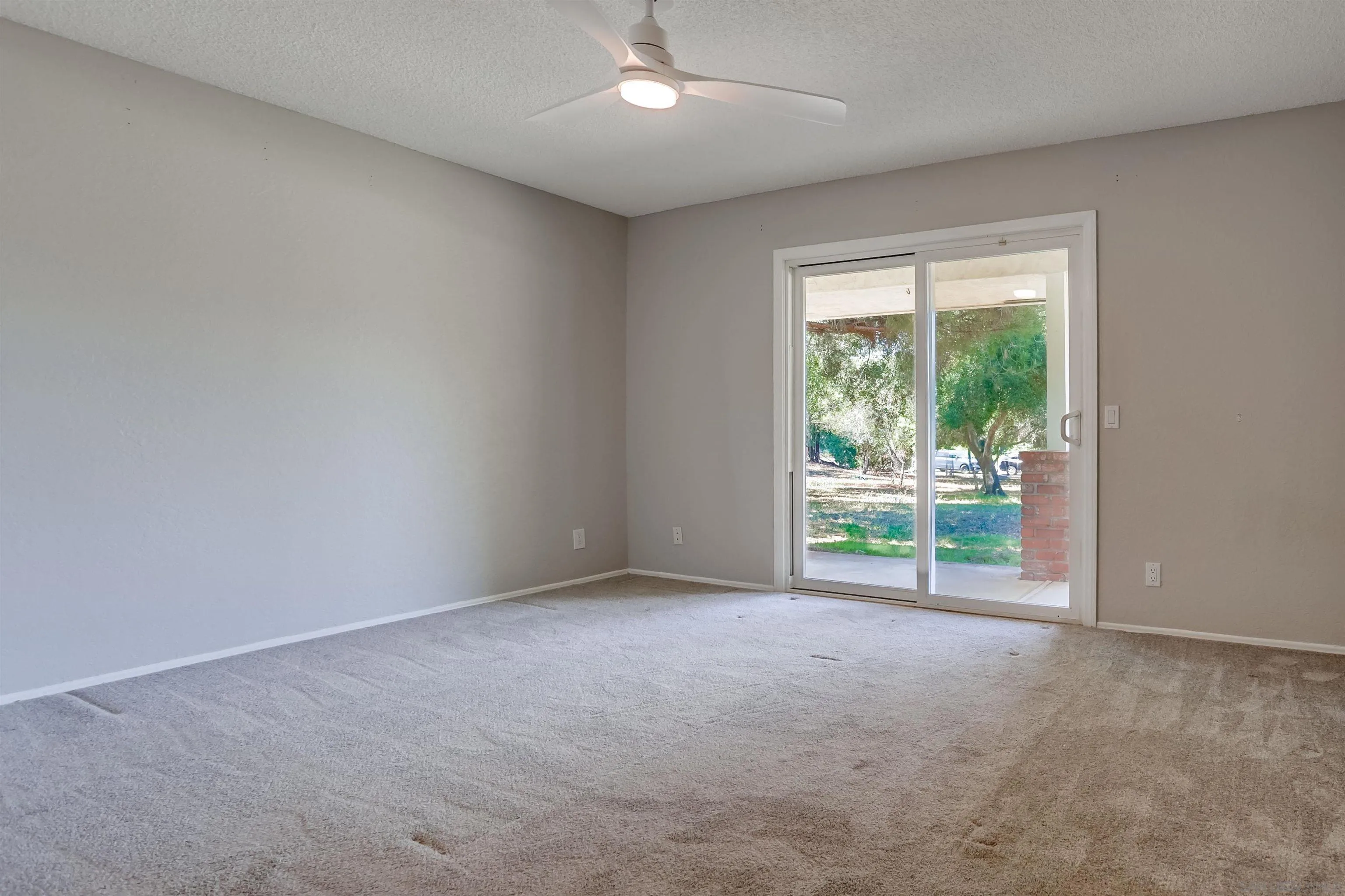 30180 Lilac Road Valley Center, CA 92082 - Photo 23 of 40 a view of an empty room with a window