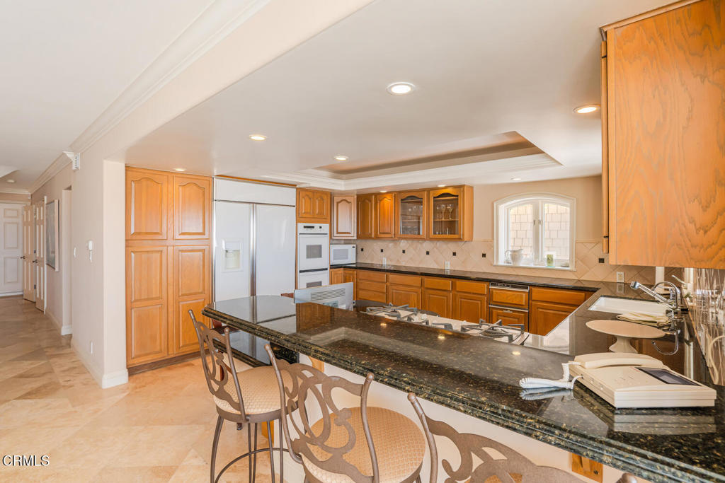 4165 Ocean Drive Oxnard, CA 93035 - Photo 14 of 44 a living room with dining table and chairs