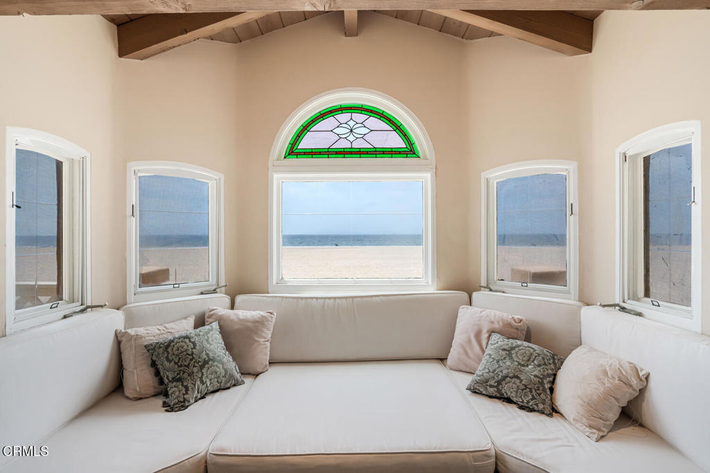 4165 Ocean Drive Oxnard, CA 93035 - Photo 21 of 44 a bedroom with a bed and a couch