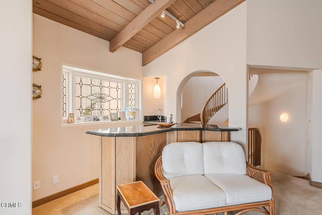 4165 Ocean Drive Oxnard, CA 93035 - Photo 22 of 44 a living room with a couch and a table