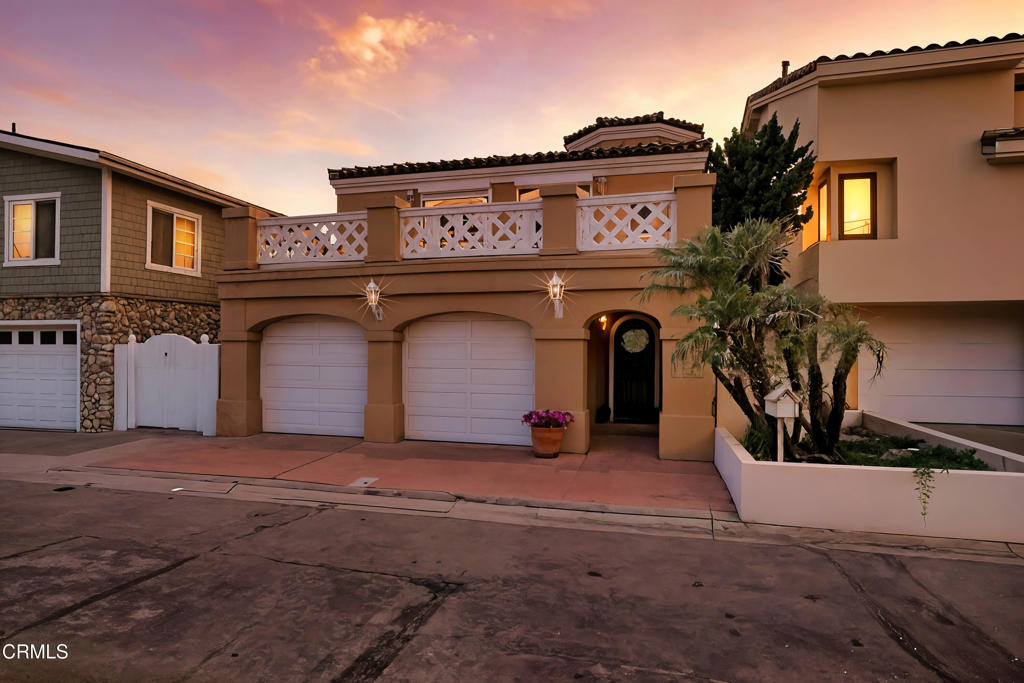 4165 Ocean Drive Oxnard, CA 93035 - Photo 42 of 44 a view of a grey house with large windows