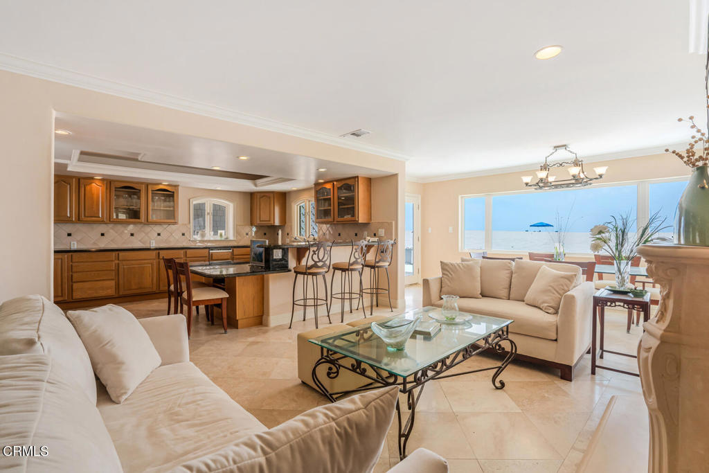 4165 Ocean Drive Oxnard, CA 93035 - Photo 10 of 44 a living room with furniture kitchen view and a table