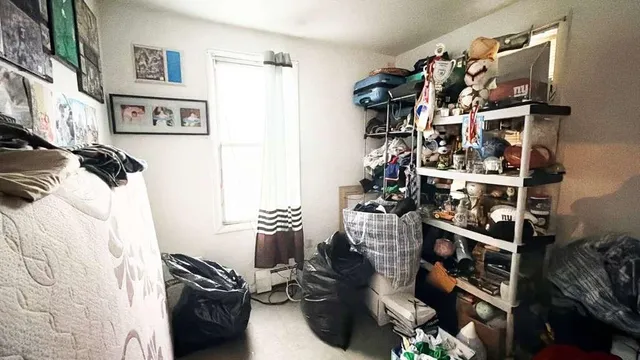 a view of a closet with storage