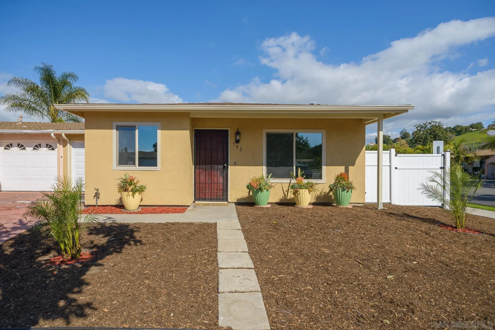 102 Magdalena Drive Oceanside, CA 92057 - Photo 1 of 48 a front view of a house with a yard