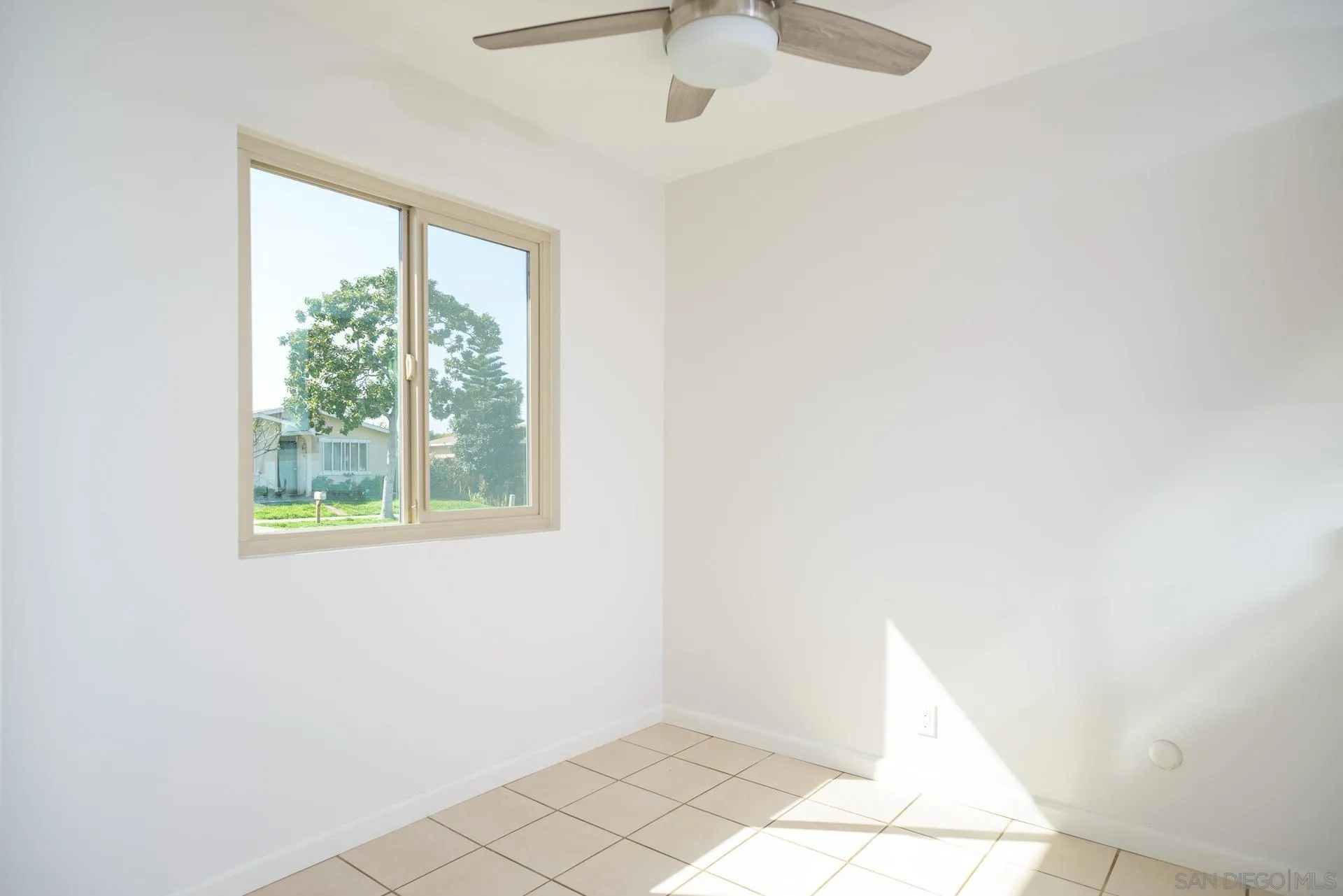 102 Magdalena Drive Oceanside, CA 92057 - Photo 19 of 48 a view of an empty room with a window