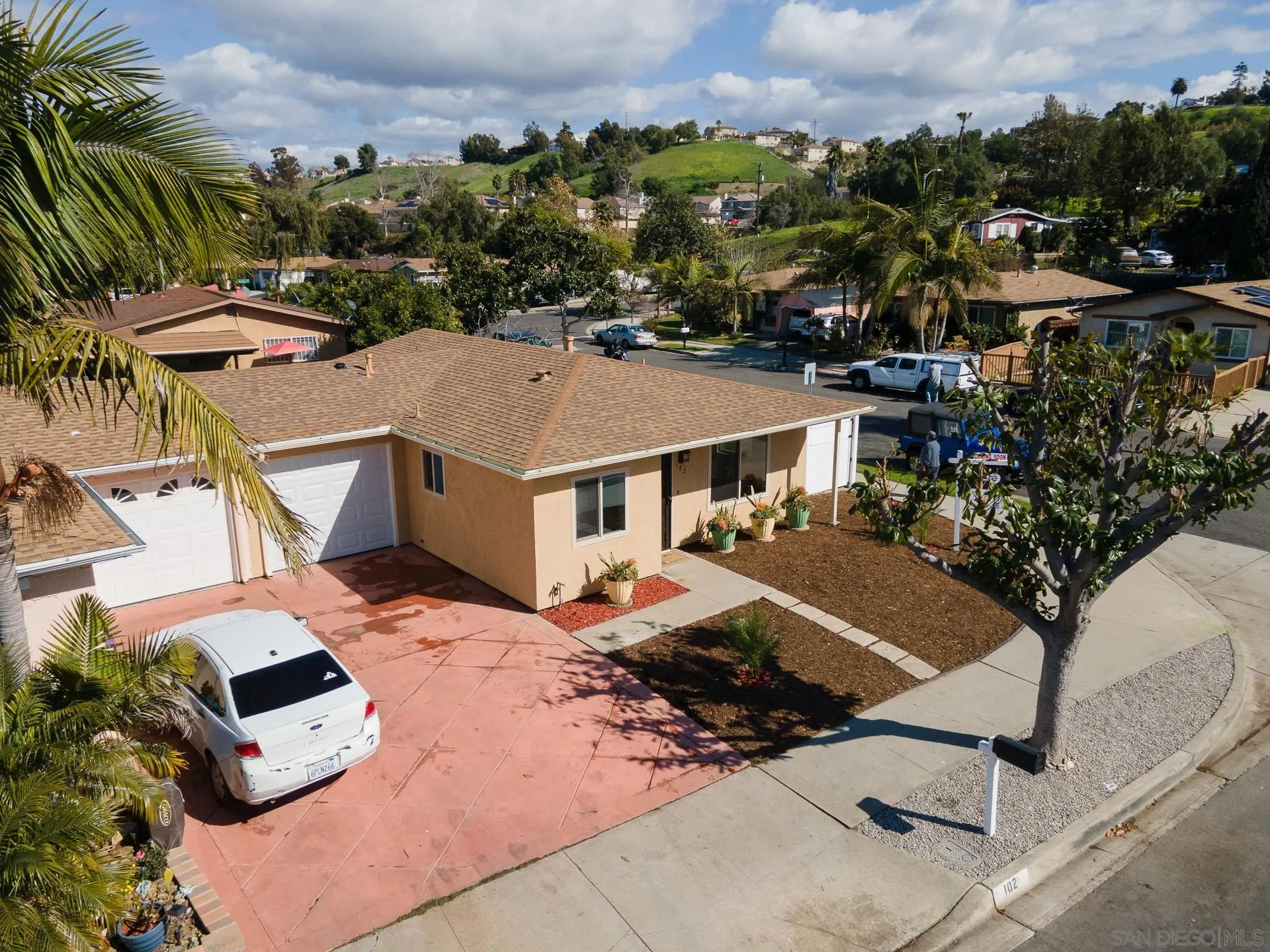 102 Magdalena Drive Oceanside, CA 92057 - Photo 2 of 48 an aerial view of multiple houses with a yard