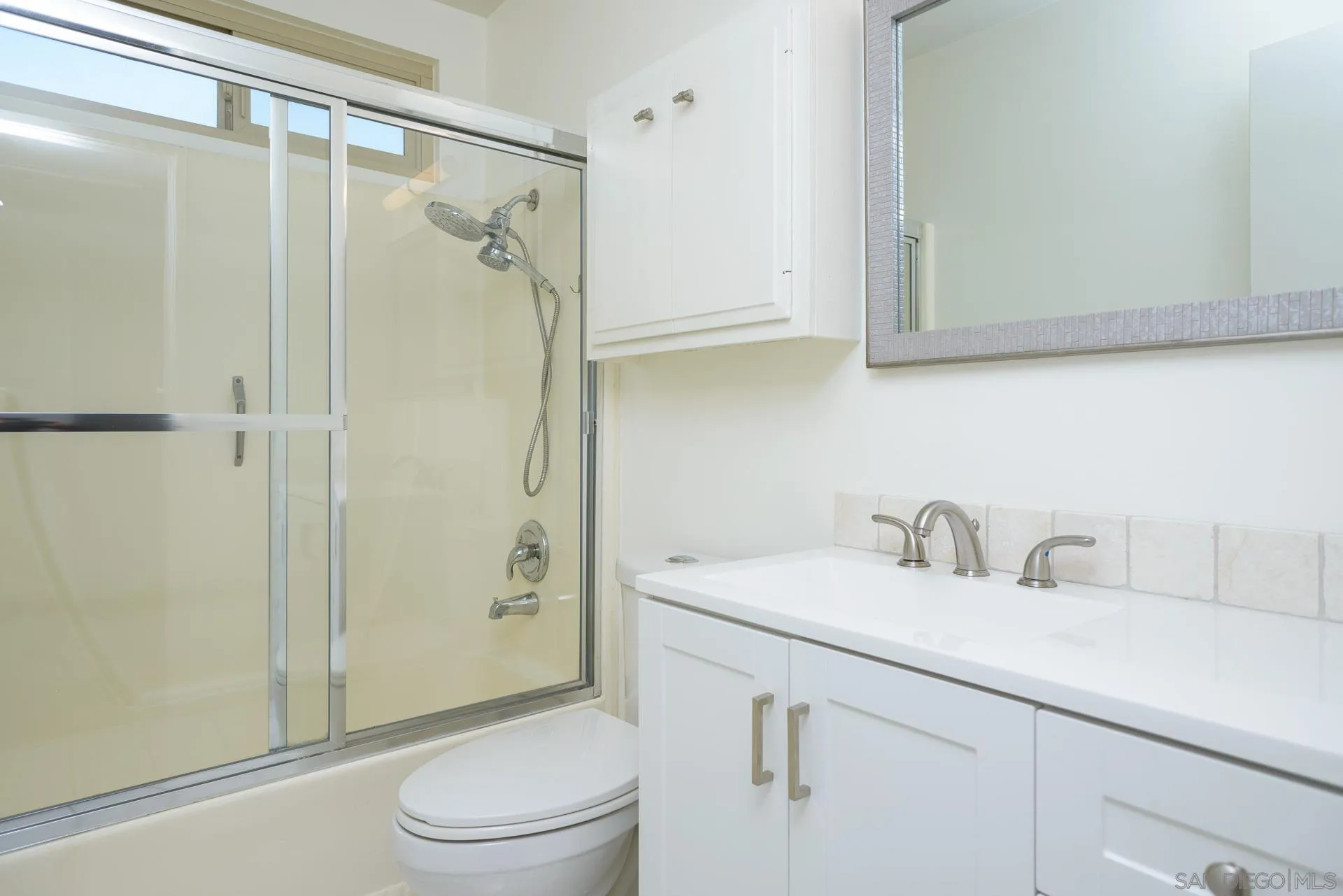 102 Magdalena Drive Oceanside, CA 92057 - Photo 30 of 48 a bathroom with a sink toilet and shower