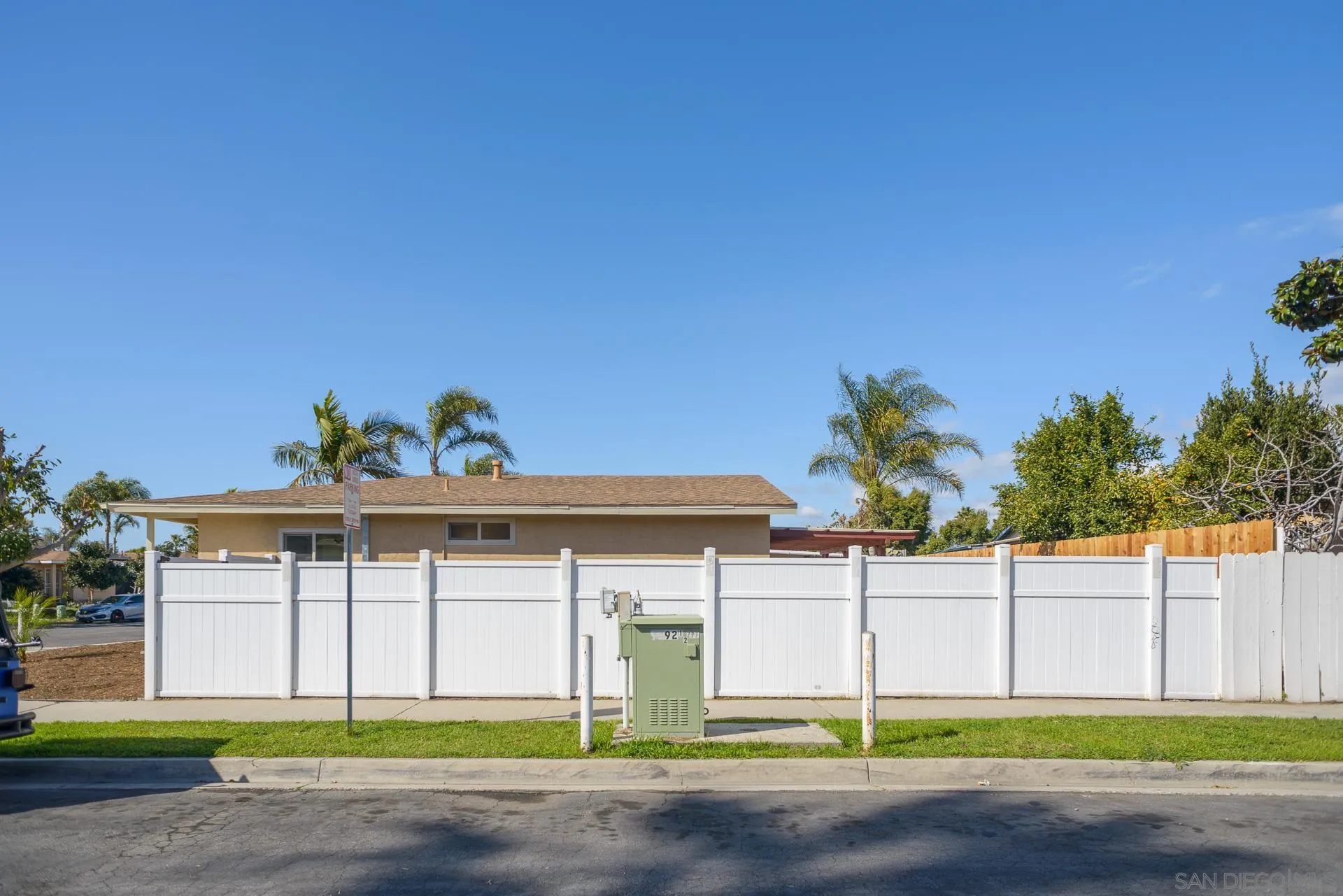 102 Magdalena Drive Oceanside, CA 92057 - Photo 39 of 48 a white house that has a sign on it