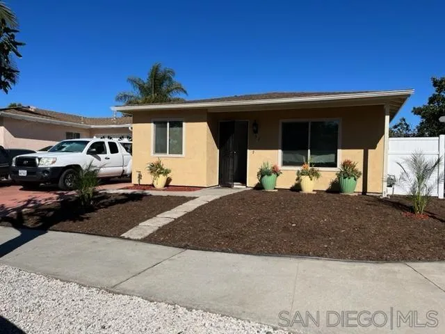 102 Magdalena Drive Oceanside, CA 92057 - Photo 43 of 48 a front view of a house with a yard