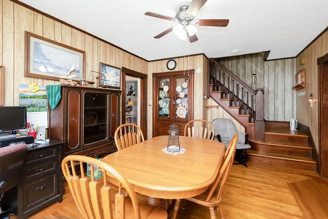 a dinning table and a livingroom with furniture