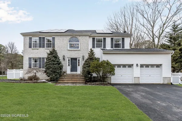 a front view of house with yard