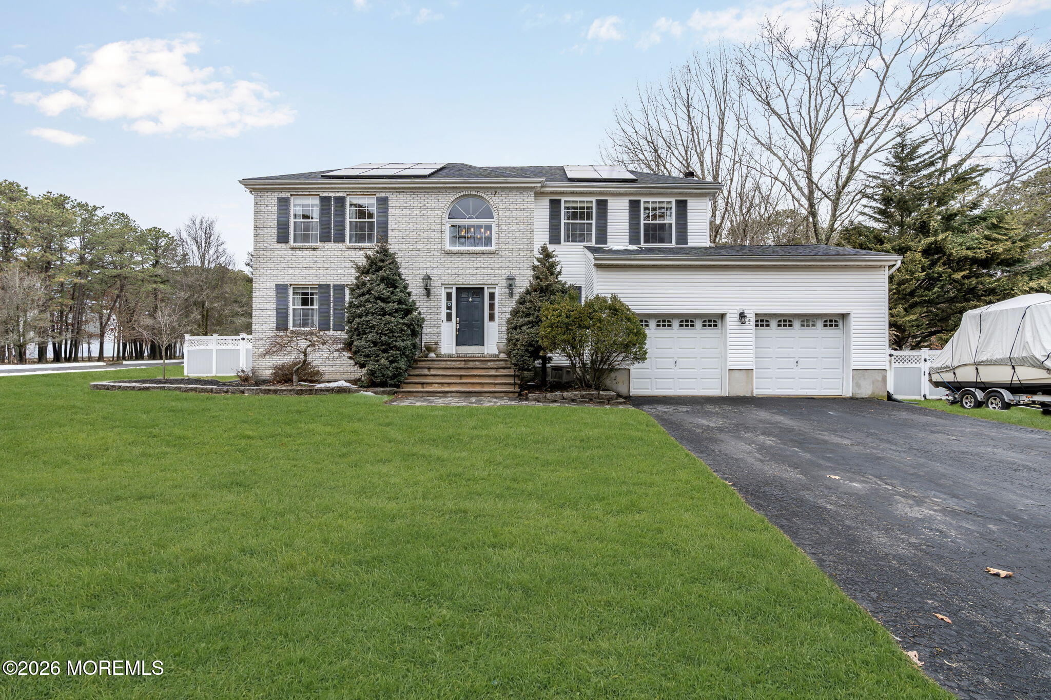 6 Candy Court Jackson, NJ 08527 - Photo 24 of 74 a front view of house with yard and green space