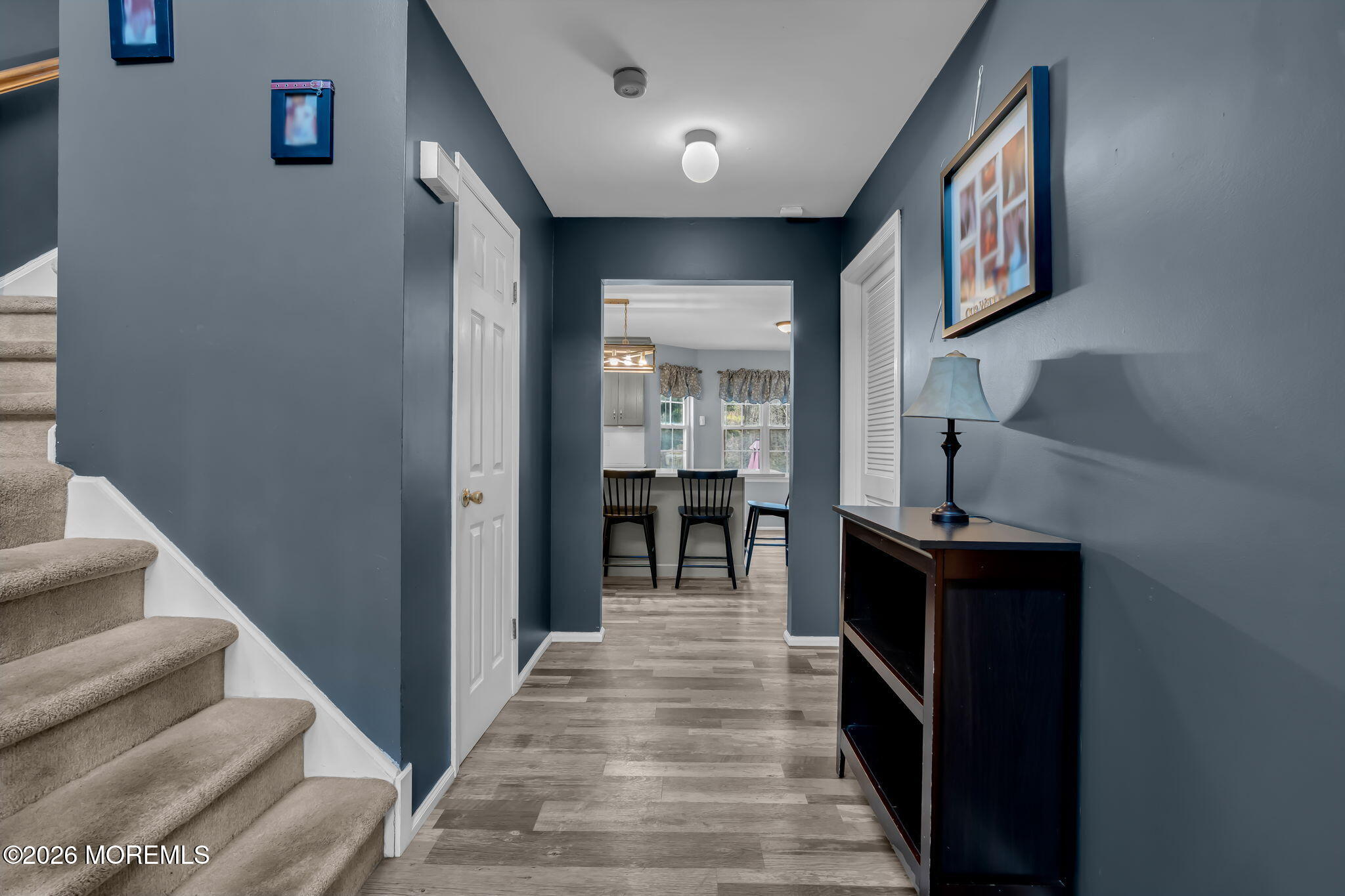 6 Candy Court Jackson, NJ 08527 - Photo 30 of 74 a view of a hallway with wooden floor and staircase